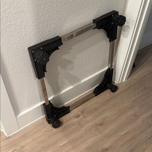 Adjustable Furniture Dolly with Black and Silver Frame - a laundry riser